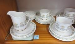 00 49 An attractive Paragon "English Rose" tea for one set produced in the