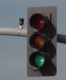 EMERGENCY PREEMPTION: Optical sensors, such as the one shown next to the signal head above, allow