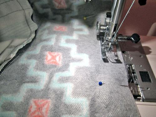 9. Re-thread the machine with thread to match the border/strap fabric. 10.