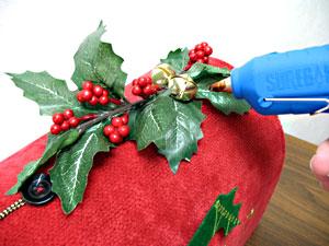 You can add embellishments like faux flowers, holly, or jingle bells.