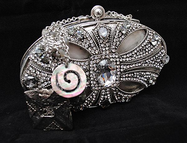CRAFTS OF CHARM Encased in a metal and silver