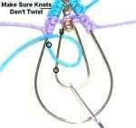 Tie the second half of the knot (under - over - under). Make sure the two knots tied on the large hoop don't twist (cord 1).