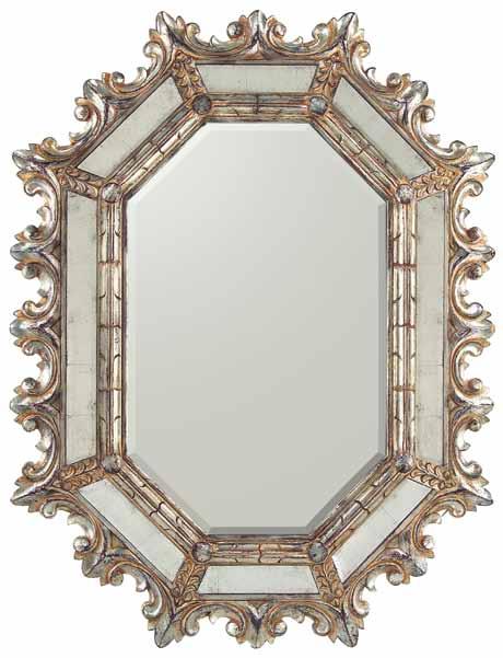 frame around the angled églomisé mirrors rise up to the central