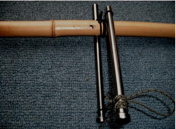 Another length of cordage can be used to keep tension on the levers, if you are working alone.