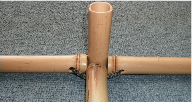 Drilled lashings have been used to connect three cross-poles to an