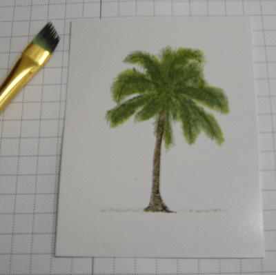 Huff on the stamp (your breath will remoisten the ink that may have dried by the time you finished coloring the stamp). Stamp the image approx. 3/4 from the bottom of the glossy white cardstock.