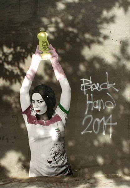 Black Hand, dubbed Iran s Banksy, painted a mural in response to the law banning women from attending football matches. Image: Citiesintransition.