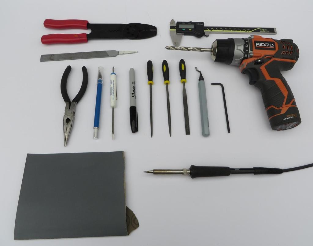 1. Assemble materials TOOLS - Needle-nose pliers - Small files (I use a triangular one 90%) - Deburring tool (much easier and safer than a knife for cleaning parts) -Exacto knife -Small philips