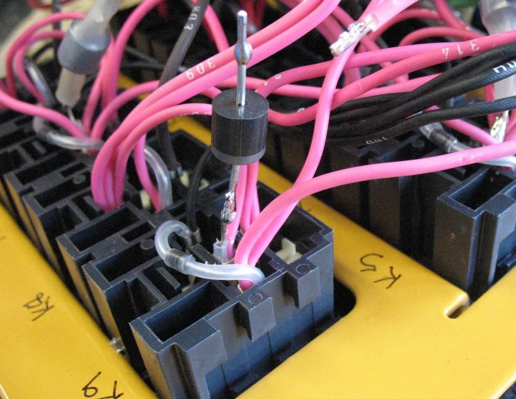 17. Locate wire 301 and the diode going into relay K9. Cut the diode out, leaving the leg of the diode going into the relay in place. 18.