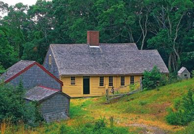 This plank house has a shake shingle roof. By the 1700s, wealthier people had begun to live in brick houses.