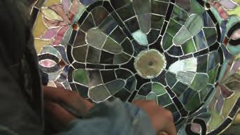 Each piece of glass is then ground to fit the shape of the mosaic pattern required.