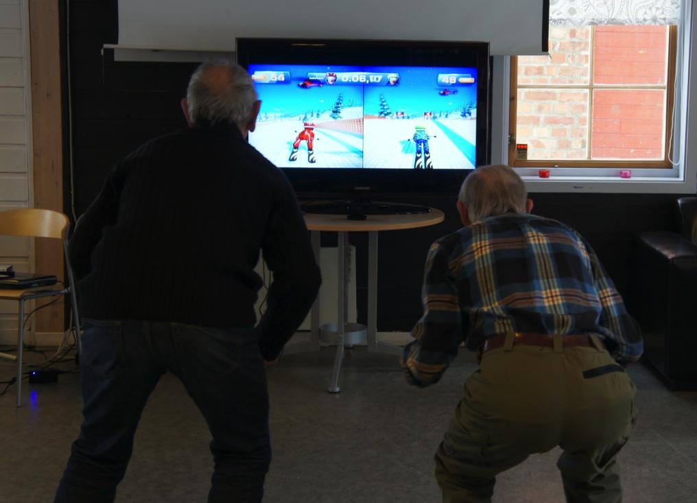 Fig. 2. Two participants compete in the skiing game in Kinect Sports Two video cameras were used from different angles for recording.