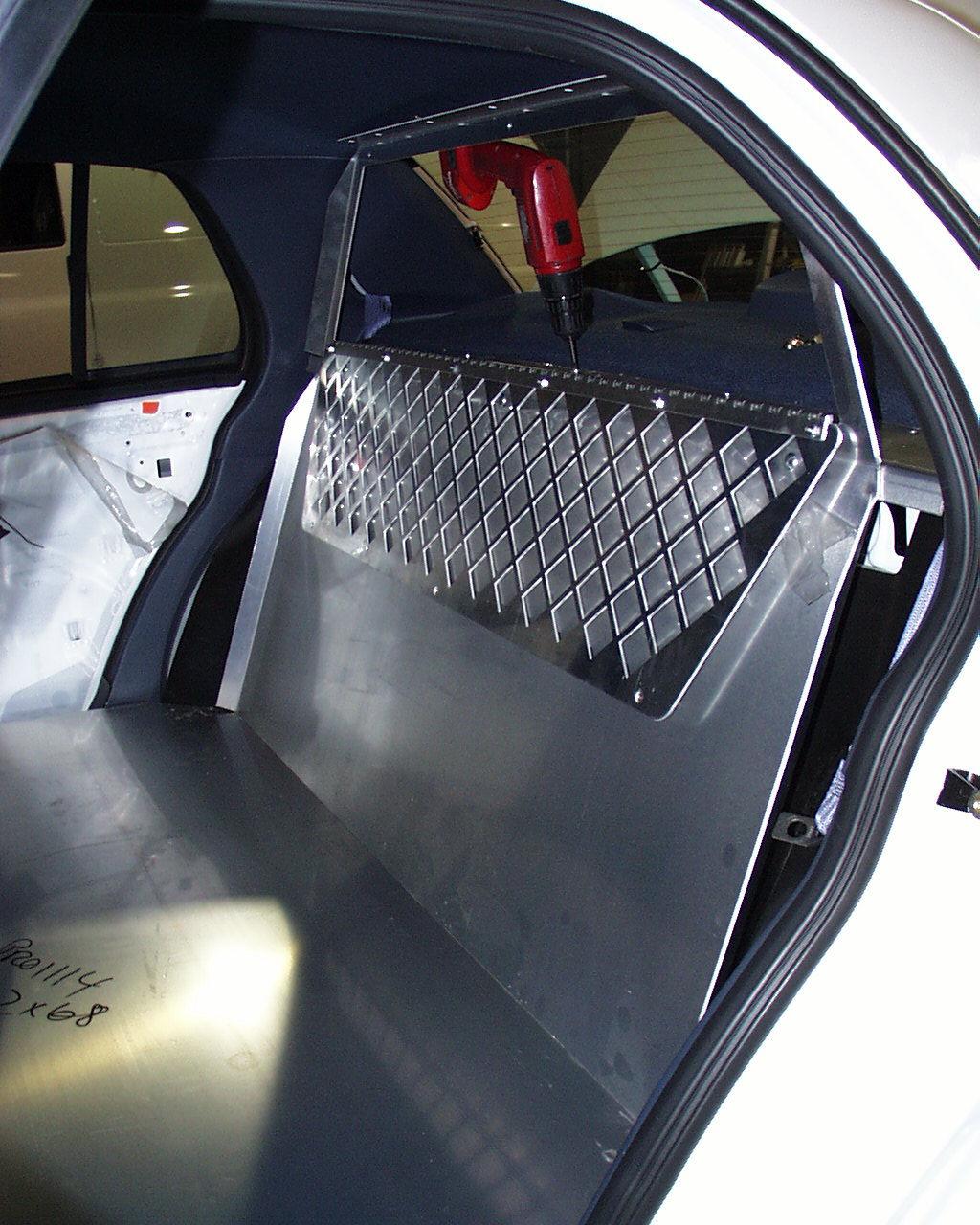 INSTALLATION: 1. Remove necessary interior trim parts: Remove rear seat (bottom and back) Remove OEM door panels.