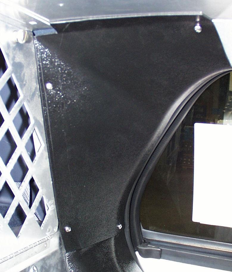 10. Rear Upper Fillers: (See photo 10) Applying pressure to rear upper filler panel, tight to rear cage ceiling and bottom