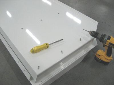Attach top of floor to riser brackets with # 10 x ½ Phillips flat head sheet metal