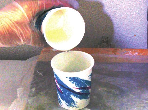 material from the sides and bottom of the cup. Slowly and thoroughly mix the material.