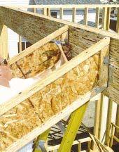 Figure 1. Sloped-seat hangers can be adjusted in the field to match the slope of the roof.