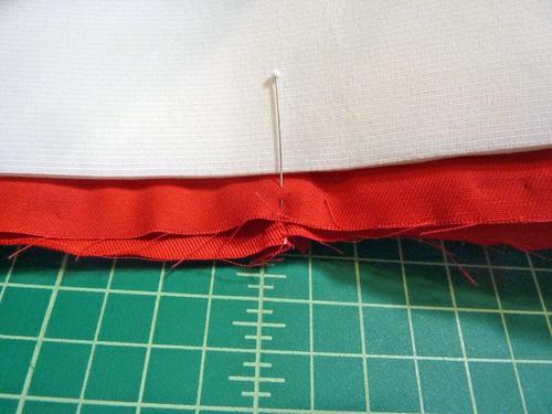 Flatten the opening so this seam aligns with the patchwork seam directly opposite it. This is the 12:00 point.