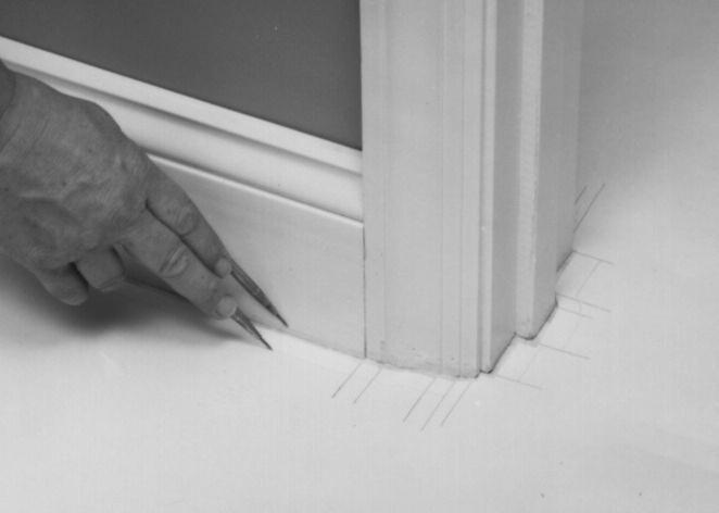 When you come to a door trim or some other offset, extend lines for all surfaces running parallel to the legs of the dividers (Fig. 37).