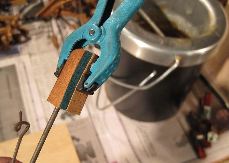 Photo 420: A miniature clamp is then applied with a small rectangle
