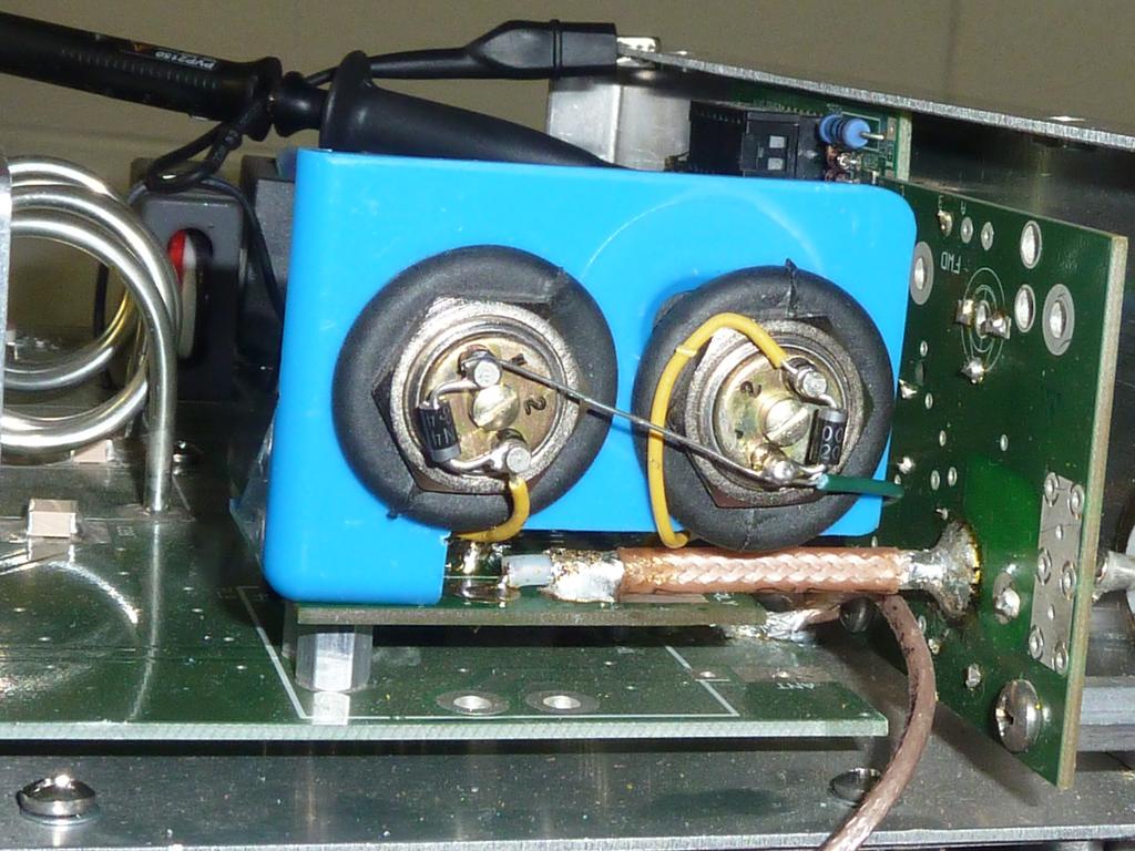 I used two Jennings RJ1-A vacuum relays (12 volt model) which can be a bit noisy if mounted directly on a board or chassis and I followed the lead of NG7M in using a mounting technique that prevents