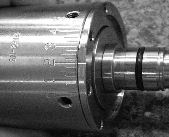 Figure 62 Turn adjustable end plate until witness mark falls between the O and 5 torque markings. See figure 63.