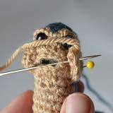 a stitch in the top of the head, then