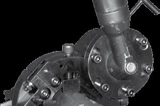 Place the motor flange over the cap screws and rotate it clockwise until the cap screws contact the end of the slots.