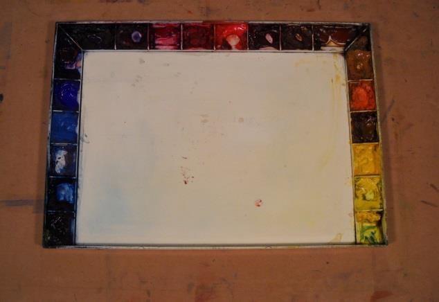 Palette Any large at least 10 x 12 - sturdy, deep welled, white plastic palette with a cover will do.