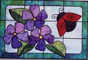 00 Ladybug s Garden in Stained Glass w/ Pam Fusible web and fusible bias tape are used to create this charming quilt as you go quilt. The finished size is 22 x 33.