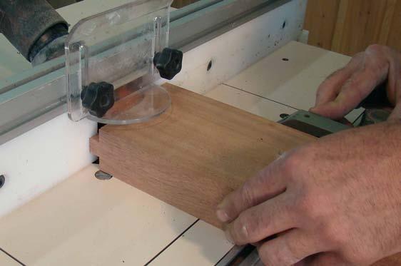 With the Gauge Stick clamped in place position the miter gauge at both ends of the table and gently slide the fence against the end of the stick.