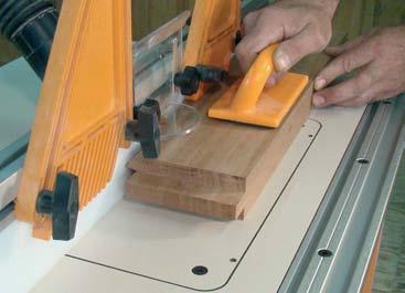 The straight edge should touch both faces of the fence and the ball bearing on the router bit.
