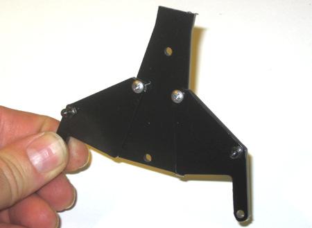 Attach the two Lip Extenders to the Nose plate with two 3 / 8 4-40 self-tapping