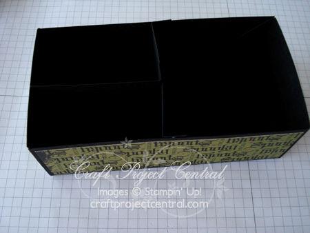 Step 4 Take the 4 x 2 piece of Basic Black card stock and score each end at ½. Repeat with the 4-¼ x 2 piece of Basic Black card stock. These two pieces will create the dividers inside the basket.