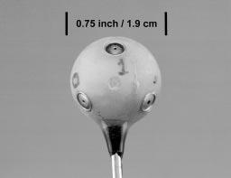 Figure 6: Photograph of the 6-element microphone array mounted in a 0.75 inch nylon sphere.