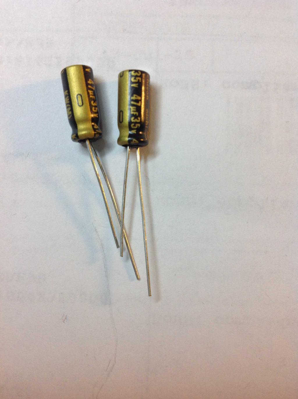 Now install the two 47uF electrolytic capacitors, C9 and C10.