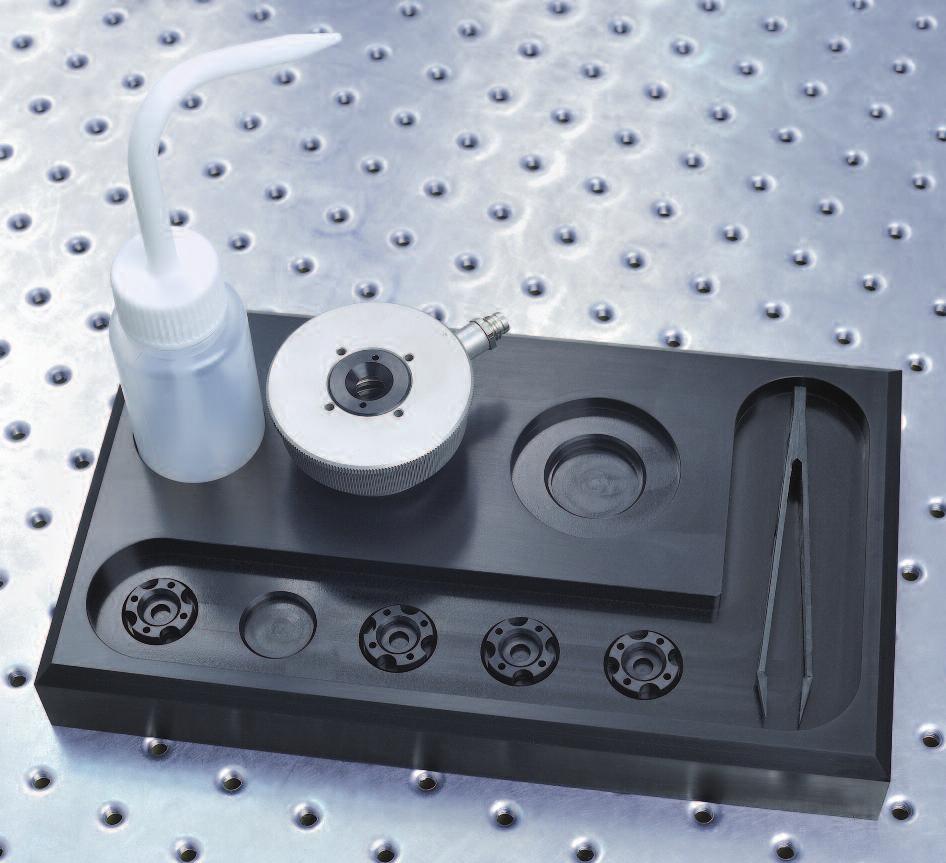 The IOL is placed at a specific position between these two plates on a sample holder including the aperture stop. An achro- 3mm Aperture 1 2 3 Saline Water n =1.