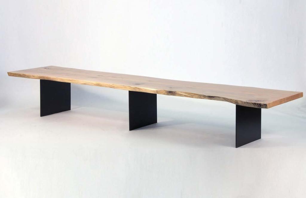 edge, live edge; bench top composed of one or more slabs Version in Torched live edge Maple with Clear finish, steel base with Dark Smoke finish NARA BENCH Solid wood top with two or
