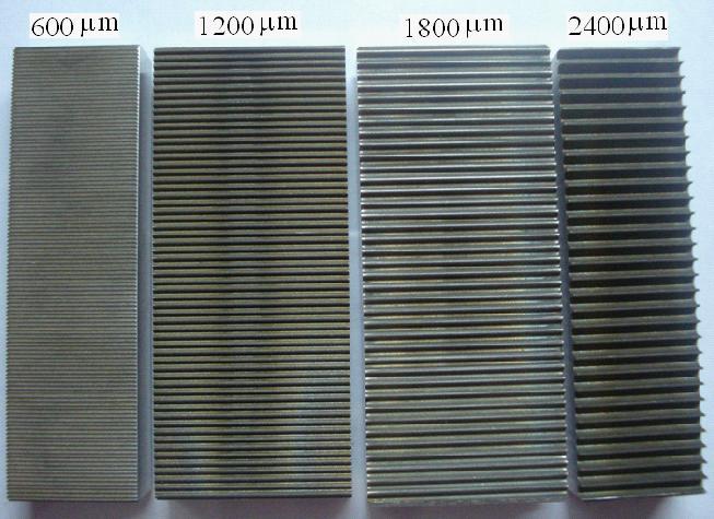 grooved plates used in experimental work Experimental result: Transmission characteristics of LPFG (600µm period) in MMF Grating Resonance