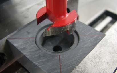 Zero the z direction on the DRO, and drill down until the depth is about 0.080 inches.