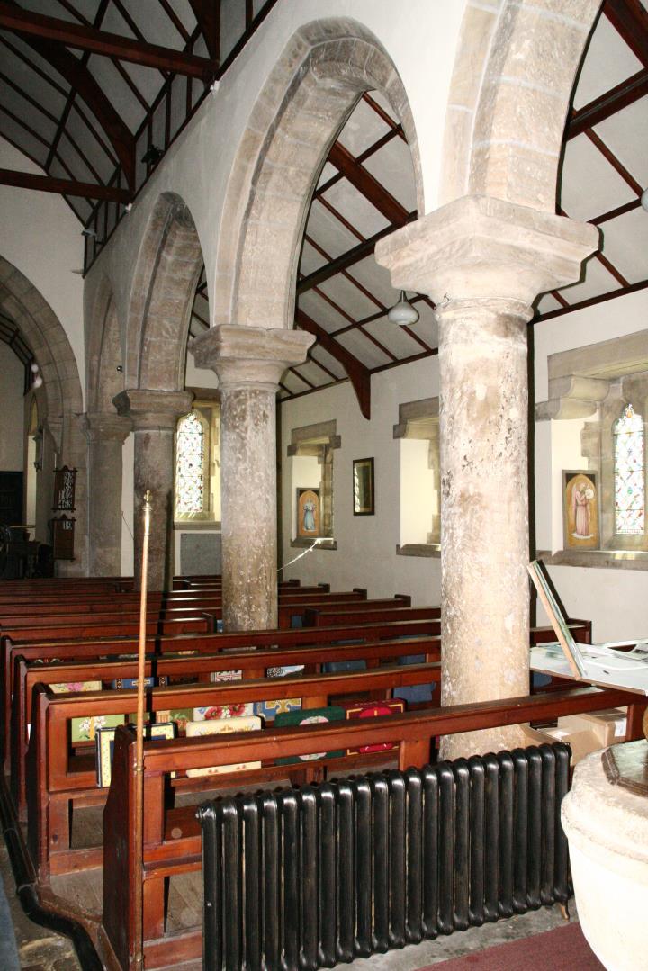 4 Within the main body of the church, the walls are plastered and cream-washed, except for exposed dressings.