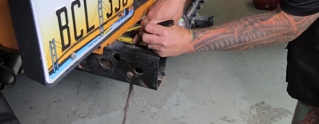 4 Remove any wiring from the hitch and crossmember