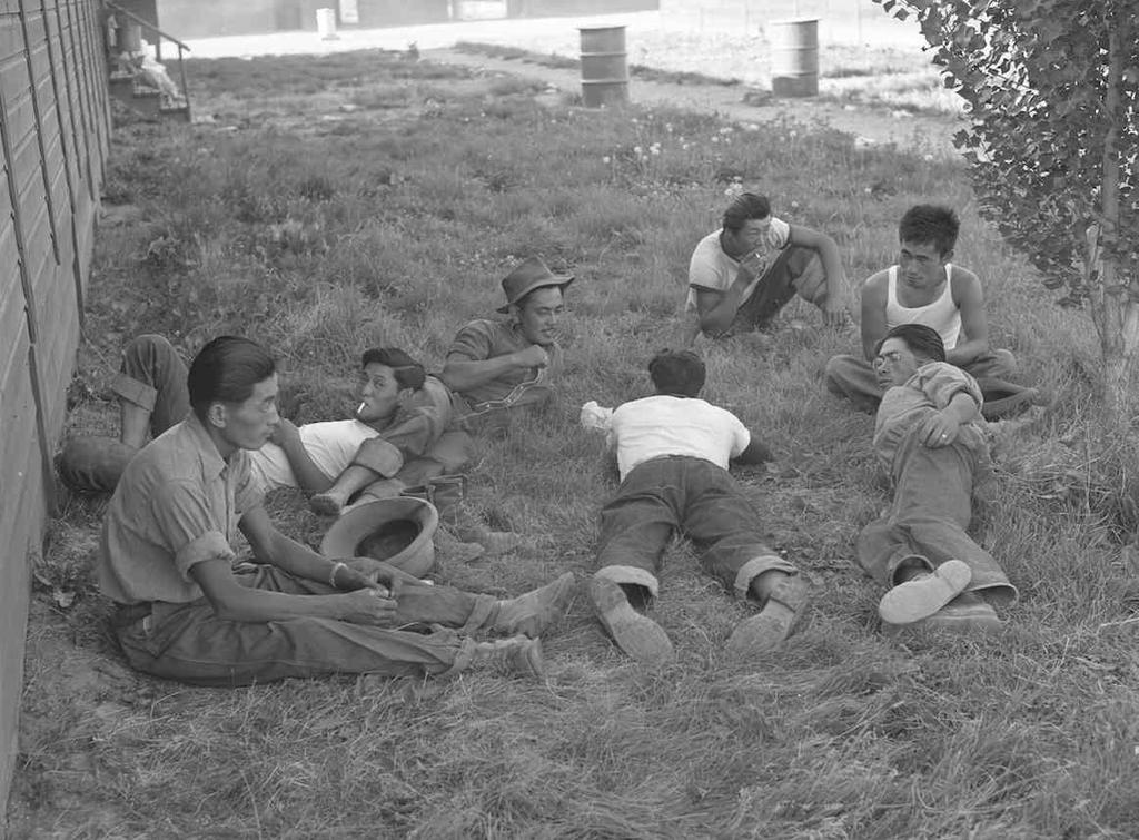 OCHC Lee #020 Resting after work at the camp near Rupert, Idaho. Rupert, Idaho. Former Civilian Conservation Corps camp now under Farm Security Administration management.