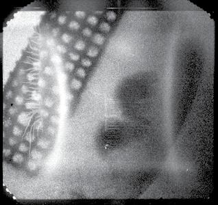 (The grid is for diagnostic reference.) X-ray backlighting provides images at various times. On the right (at 12 ns) the shock is still visible, just to the right of the spheres.