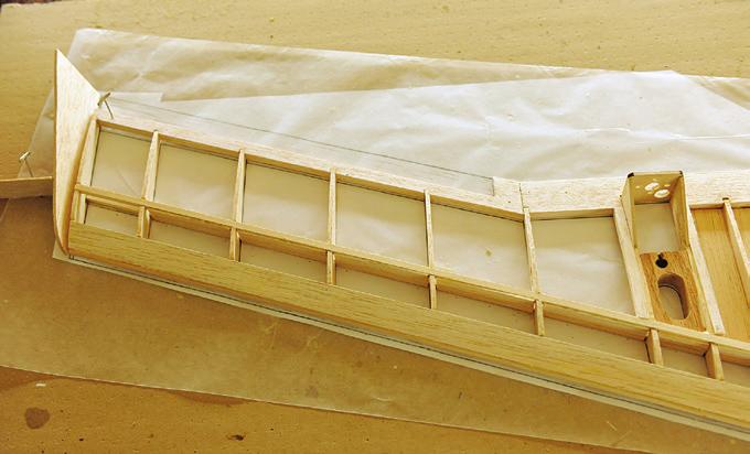Glue in the upper spar to both left and right wings, then glue in the 1 / 4-inch round dowel LE into the front of all ribs.