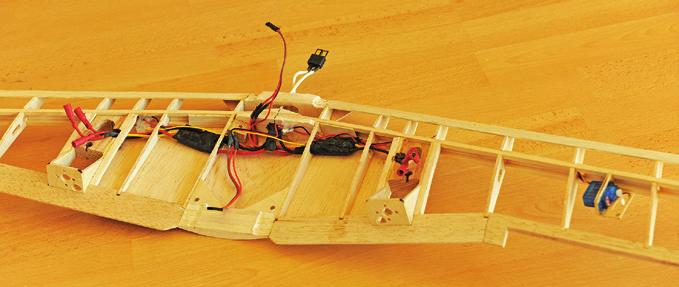 The motor mount gussets can also be glued in during this step (Figure 4). The oak landing gear blocks and the winglets have been glued in place (Figure 5).