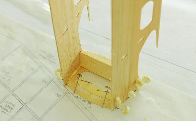 Cut out the balsa to create the cooling hole in the center and the 1 / 4-inch diameter holes for the mounting on both sides.