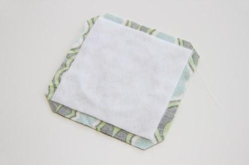 For the back of each coaster, cut a 4-1/2 square from your coordinating print fabric.