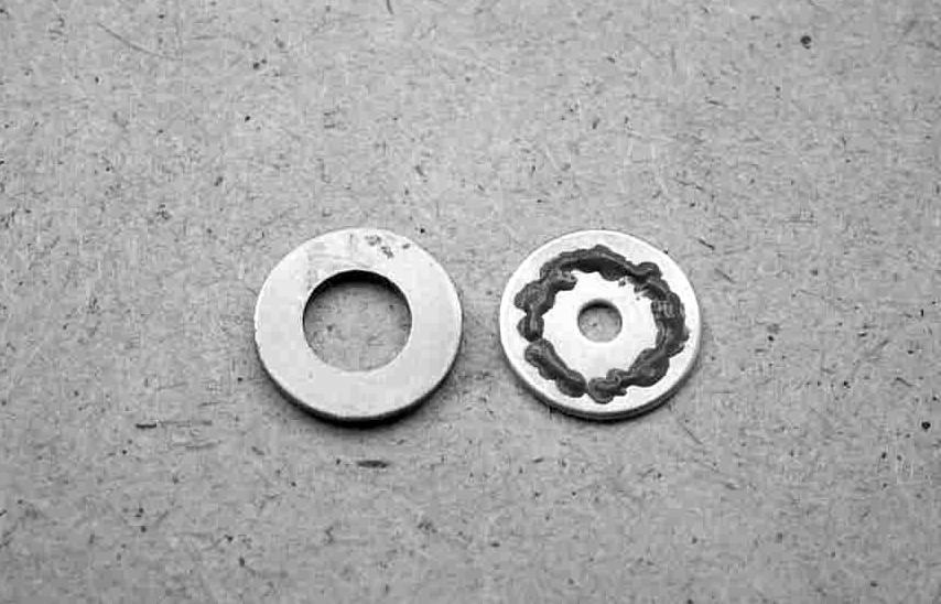 The two washers must be soldered together and for this we require some solder paint and our gas torch.