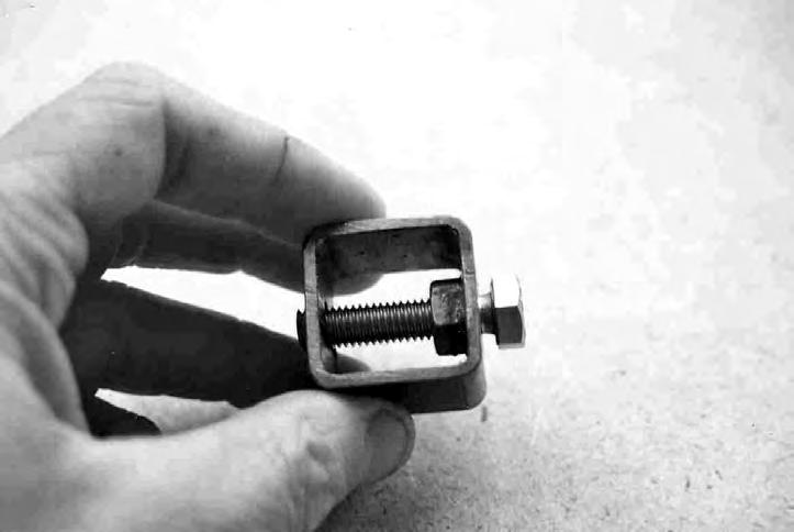 as shown in the above photo. Screw in the die bolt. An 8mm bolt, 2 in length, is now screwed into the die.